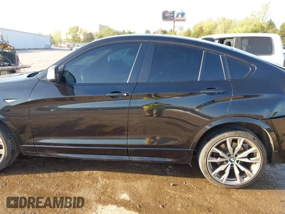 ✅ 2016 BMW X4 M40i • VIN: 5UXXW7C59G0M91223 • Lot: 42009394. Listed on IAAI with 144,771 mi. Free auction sales archive from the USA and detailed vehicle history report at DreamBid. Image 14.