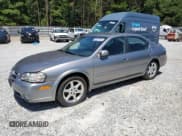 ✅ 2003 Nissan Maxima GLE • VIN: JN1DA31A13T403725 • Лот: 66225195. Опубликован ранее на Copart с пробегом 154 894 миль. Бесплатный доступ к архиву аукционных продаж из США и подробный отчёт об истории автомобиля на DreamBid. Изображение 1.