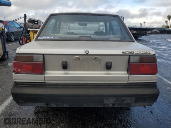 ✅ 1987 Toyota Corolla • VIN: JT2AE82E9H3531391 • Лот: 44657375. Опубликован ранее на Copart с пробегом 240 376 миль. Бесплатный доступ к архиву аукционных продаж из США и подробный отчёт об истории автомобиля на DreamBid. Изображение 6.