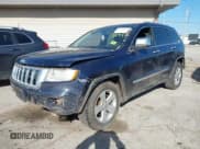 ✅ 2013 Jeep Grand Cherokee Laredo • VIN: 1C4RJFAG0DC501686 • Lot: 43555997. Listed on IAAI with 161,404 mi. Free auction sales archive from the USA and detailed vehicle history report at DreamBid. Image 2.