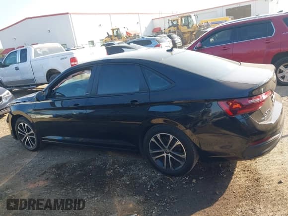 ✅ 2023 Volkswagen Jetta Sport • VIN: 3VWAM7BU5PM052116 • Lot: 43210653. Listed on IAAI with 27,675 mi. Free auction sales archive from the USA and detailed vehicle history report at DreamBid. Image 14.