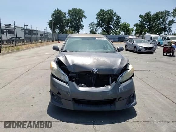 ✅ 2009 Toyota Matrix XRS • VIN: 2T1GE40E09C001185 • Лот: 58598365. Опубликован ранее на Copart с пробегом 288 475 миль. Бесплатный доступ к архиву аукционных продаж из США и подробный отчёт об истории автомобиля на DreamBid. Изображение 13.