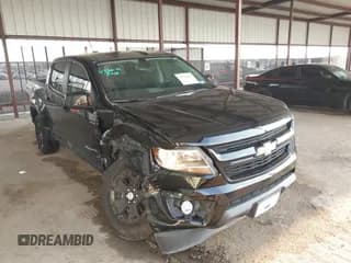 ✅ 2020 Chevrolet Colorado 2WD LT • VIN: 1GCGSCEA1L1240460 • Lot: 43262655. Listed on IAAI with 83,560 mi. Free auction sales archive from the USA and detailed vehicle history report at DreamBid. Image 1.