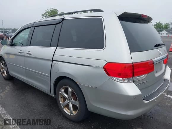✅ 2009 Honda Odyssey Touring • VIN: 5FNRL38859B029714 • Lot: 42266381. Wystawiony na IAAI z przebiegiem 196 747 mil. Bezpłatny archiwum sprzedaży aukcyjnych z USA i szczegółowy raport historii pojazdu na DreamBid. Zdjęcie 3.