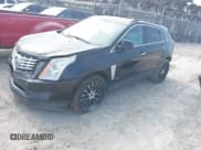 ✅ 2015 Cadillac SRX • VIN: 3GYFNAE38FS593171 • Lot: 42274159. Wystawiony na IAAI z przebiegiem 104 049 mil. Bezpłatny archiwum sprzedaży aukcyjnych z USA i szczegółowy raport historii pojazdu na DreamBid. Zdjęcie 2.