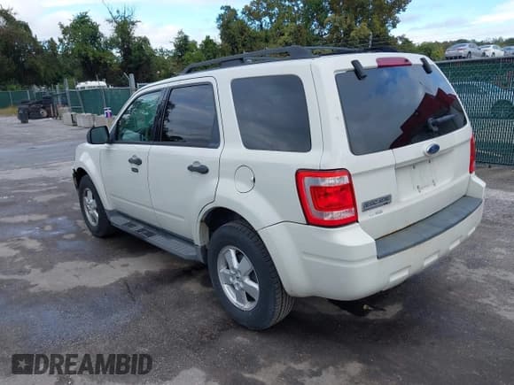 ✅ 2009 Ford Escape XLT • VIN: 1FMCU03769KC57512 • Lot: 43399599. Listed on IAAI with 198,628 mi. Free auction sales archive from the USA and detailed vehicle history report at DreamBid. Image 3.