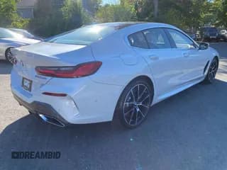 ✅ 2021 BMW 8 Series M850i • VIN: WBAGV8C01MCG76388 • Лот: 90394145. Опубликован ранее на Copart с пробегом 62 877 миль. Бесплатный доступ к архиву аукционных продаж из США и подробный отчёт об истории автомобиля на DreamBid. Изображение 3.