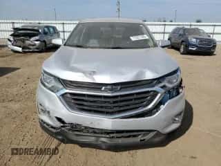 2018 Chevrolet Equinox LT с VIN 2GNAXJEV7J6263922, выставлен на аукционе Copart как лот 71521165 с пробегом 74 123 миль миль и Списание • Salvage title. История ставок и продаж доступна на DreamBid. Изображение 5.