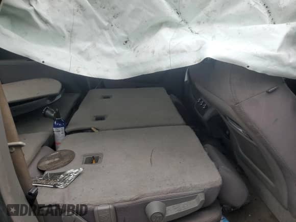 2011 Chevrolet Traverse LS с VIN 1GNKVEED6BJ197876, выставлен на аукционе Copart как лот 69856945 с пробегом Не указан миль и Чистый • Clean title. История ставок и продаж доступна на DreamBid. Изображение 11.