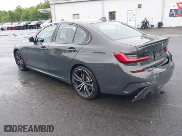2022 BMW 3 Series 330i xDrive with VIN WBA5R7C05NFM16689, listed as a IAAI auction lot 42530938 with 56,777 mi miles and . Bid and sale history available at DreamBid. Image 3.