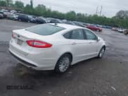 ✅ 2014 Ford Fusion SE Luxury • VIN: 3FA6P0PU4ER382884 • Lot: 42211284. Listed on IAAI with 125,027 mi. Free auction sales archive from the USA and detailed vehicle history report at DreamBid. Image 4.