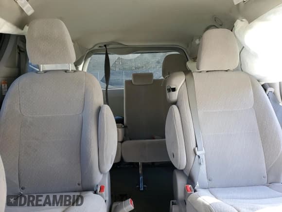 ✅ 2015 Toyota Sienna LE • VIN: 5TDKK3DC5FS567142 • Lot: 82650295. Listed on Copart with Not provided. Free auction sales archive from the USA and detailed vehicle history report at DreamBid. Image 10.