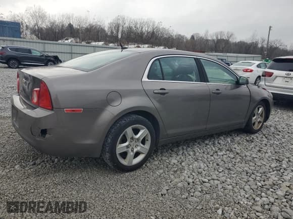 ✅ 2011 Chevrolet Malibu 1LS • VIN: 1G1ZB5E16BF360706 • Lot: 81413444. Listed on Copart with 135,830 mi. Free auction sales archive from the USA and detailed vehicle history report at DreamBid. Image 3.