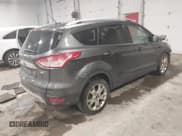 ✅ 2015 Ford Escape Titanium • VIN: 1FMCU9JX5FUA35888 • Lot: 41209408. Listed on IAAI with 125,378 mi. Free auction sales archive from the USA and detailed vehicle history report at DreamBid. Image 4.
