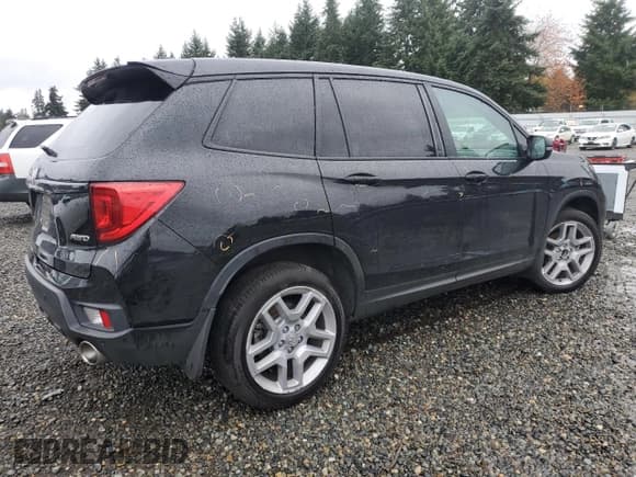 ✅ 2024 Honda Passport EX-L • VIN: 5FNYF8H59RB003820 • Lot: 92575885. Listed on Copart with 28,137 mi. Free auction sales archive from the USA and detailed vehicle history report at DreamBid. Image 3.