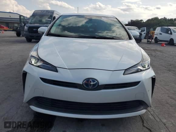 2021 Toyota Prius L Eco with VIN JTDKAMFU9M3139796, listed as a Copart auction lot 71665595 with 89,976 mi miles and Salvage title. Bid and sale history available at DreamBid. Image 5.