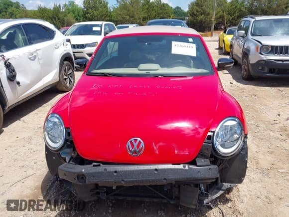 ✅ 2013 Volkswagen Beetle 2.0T w/Sound/Nav • VIN: 3VW7A7AT5DM801567 • Лот: 42266410. Опубликован ранее на IAAI с пробегом 37 190 миль. Бесплатный доступ к архиву аукционных продаж из США и подробный отчёт об истории автомобиля на DreamBid. Изображение 13.