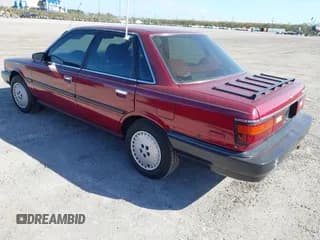 ✅ 1989 Toyota Camry DLX • VIN: 4T1SV21E9KU059104 • Лот: 41014925. Опубликован ранее на IAAI с пробегом 312 844 миль. Бесплатный доступ к архиву аукционных продаж из США и подробный отчёт об истории автомобиля на DreamBid. Изображение 3.