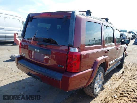 ✅ 2007 Jeep Commander Sport • VIN: 1J8HG48P37C695017 • Lot: 43022635. Listed on IAAI with 181,902 mi. Free auction sales archive from the USA and detailed vehicle history report at DreamBid. Image 4.