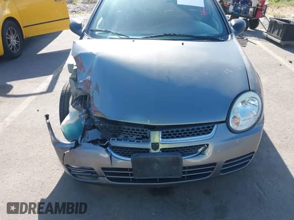 2005 Dodge Neon SXT z VIN 1B3ES56C95D221418, wystawiony jako IAAI lot #42353948 z przebiegiem 128 537 mil mil oraz . Historia ofert i sprzedaży dostępna na DreamBid. Obrazek 13.
