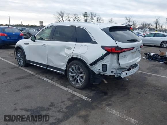 ✅ 2024 Mazda CX-90 Premium Plus • VIN: JM3KKEHD1R1101523 • Lot: 41498358. Listed on IAAI with 19,866 mi. Free auction sales archive from the USA and detailed vehicle history report at DreamBid. Image 3.