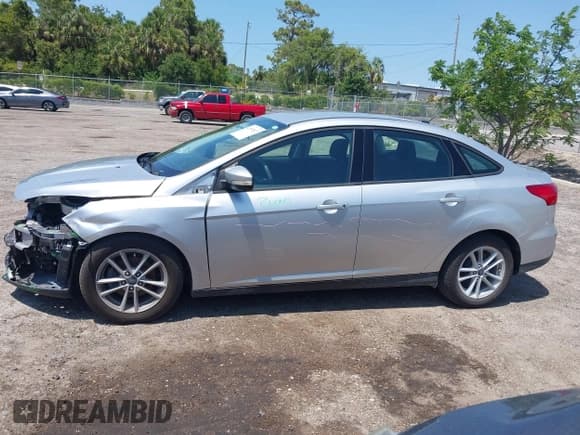 ✅ 2017 Ford Focus SE • VIN: 1FADP3F25HL304819 • Lot: 42197817. Listed on IAAI with 41,999 mi. Free auction sales archive from the USA and detailed vehicle history report at DreamBid. Image 14.