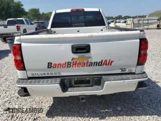 2018 Chevrolet Silverado 1500 LT с VIN 1GCUKREC7JF124610, выставлен на аукционе Copart как лот 65328055 с пробегом 216 175 миль миль и Списание • Salvage title. История ставок и продаж доступна на DreamBid. Изображение 6.