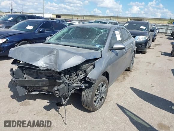 ✅ 2023 Kia Forte LXS • VIN: 3KPF24AD2PE606561 • Lot: 43400482. Listed on IAAI with 61,935 mi. Free auction sales archive from the USA and detailed vehicle history report at DreamBid. Image 2.
