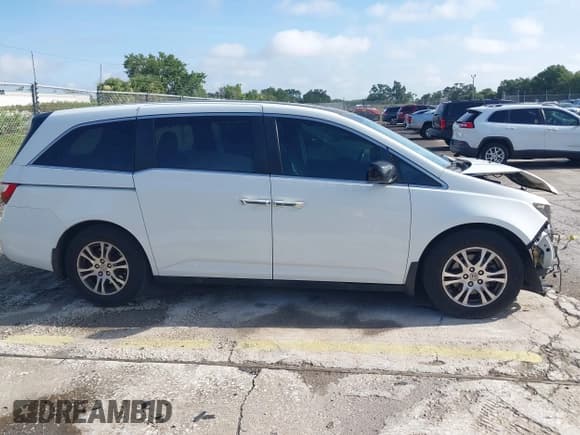 ✅ 2012 Honda Odyssey EX-L • VIN: 5FNRL5H61CB032353 • Lot: 42471691. Listed on IAAI with 186,257 mi. Free auction sales archive from the USA and detailed vehicle history report at DreamBid. Image 13.