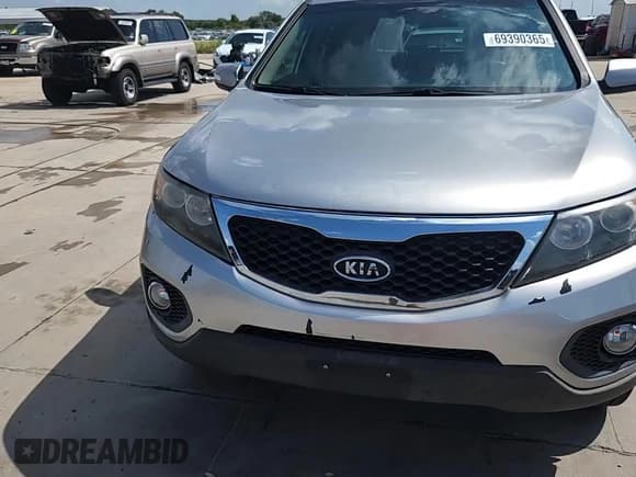 ✅ 2013 Kia Sorento LX • VIN: 5XYKT4A26DG325744 • Lot: 69390365. Listed on Copart with 157,426 mi. Free auction sales archive from the USA and detailed vehicle history report at DreamBid. Image 14.