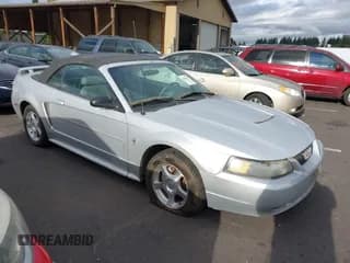 ✅ 2003 Ford Mustang Deluxe • VIN: 1FAFP44413F421209 • Lot: 42907903. Listed on IAAI with 109,001 mi. Free auction sales archive from the USA and detailed vehicle history report at DreamBid. Image 1.