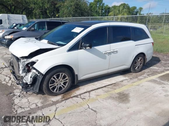 ✅ 2012 Honda Odyssey EX-L • VIN: 5FNRL5H61CB032353 • Lot: 42471691. Listed on IAAI with 186,257 mi. Free auction sales archive from the USA and detailed vehicle history report at DreamBid. Image 2.