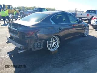 ✅ 2014 Infiniti Q50 Premium • VIN: JN1BV7AP3EM680025 • Лот: 43559135. Опубликован ранее на IAAI с пробегом 119 301 миль. Бесплатный доступ к архиву аукционных продаж из США и подробный отчёт об истории автомобиля на DreamBid. Изображение 4.