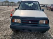 ✅ 1998 Suzuki Sidekick JX • VIN: 2S3TD03V8W6404819 • Лот: 70541335. Опубликован ранее на Copart с пробегом 174 367 миль. Бесплатный доступ к архиву аукционных продаж из США и подробный отчёт об истории автомобиля на DreamBid. Изображение 5.