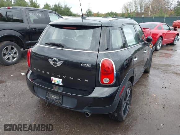 ✅ 2015 MINI Countryman • VIN: WMWZB3C51FWR46556 • Lot: 40784643. Listed on IAAI with 106,357 mi. Free auction sales archive from the USA and detailed vehicle history report at DreamBid. Image 4.