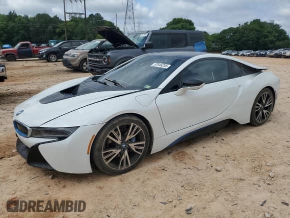 ✅ 2016 BMW i8 • VIN: WBY2Z2C51GV676132 • Лот: 57046255. Опубликован ранее на Copart с пробегом 73 901 миль. Бесплатный доступ к архиву аукционных продаж из США и подробный отчёт об истории автомобиля на DreamBid. Изображение 1.
