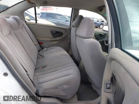 2003 Chevrolet Malibu z VIN 1G1ND52J63M580342, wystawiony jako IAAI lot #41275300 z przebiegiem 156 346 mil mil oraz . Historia ofert i sprzedaży dostępna na DreamBid. Obrazek 8.