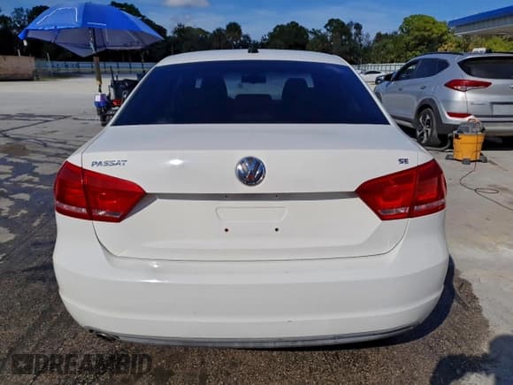 ✅ 2012 Volkswagen Passat SE • VIN: 1VWBP7A31CC070287 • Lot: 93894685. Listed on Copart with 122,563 mi. Free auction sales archive from the USA and detailed vehicle history report at DreamBid. Image 6.