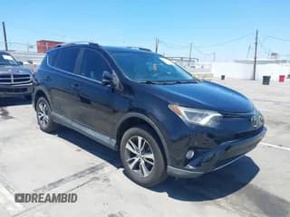 ✅ 2018 Toyota RAV4 XLE • VIN: 2T3WFREV1JW519735 • Lot: 42815544. Listed on IAAI with 58,652 mi. Free auction sales archive from the USA and detailed vehicle history report at DreamBid. Image 1.