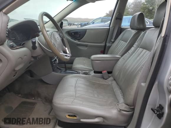 2003 Chevrolet Malibu LS z VIN 1G1NE52J63M692040, wystawiony jako Copart lot #72991244 z przebiegiem 155 367 mil mil oraz Czysty tytuł • Clean title. Historia ofert i sprzedaży dostępna na DreamBid. Obrazek 7.