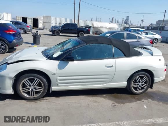✅ 2004 Mitsubishi Eclipse GTS • VIN: 4A3AE75H54E112991 • Lot: 43098404. Listed on IAAI with 140,349 mi. Free auction sales archive from the USA and detailed vehicle history report at DreamBid. Image 14.