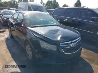 ✅ 2013 Chevrolet Cruze LS • VIN: 1G1PA5SH6D7252921 • Lot: 43276487. Listed on IAAI with 147,052 mi. Free auction sales archive from the USA and detailed vehicle history report at DreamBid. Image 1.