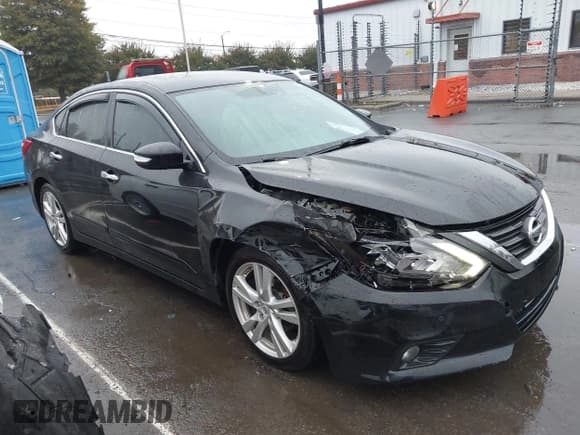 ✅ 2016 Nissan Altima SL • VIN: 1N4BL3AP2GC291189 • Lot: 43572471. Listed on IAAI with 104,412 mi. Free auction sales archive from the USA and detailed vehicle history report at DreamBid. Image 13.