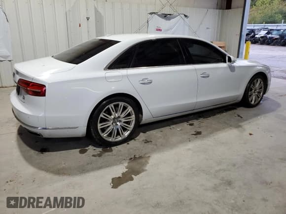 ✅ 2015 Audi A8 3.0L TDI • VIN: WAU3MAFD5FN012106 • Lot: 72339284. Listed on Copart with 138,103 mi. Free auction sales archive from the USA and detailed vehicle history report at DreamBid. Image 3.