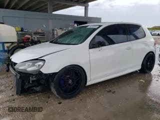 ✅ 2012 Volkswagen Golf R w/Sunroof & Navi • VIN: WVWRF7AJ7CW266591 • Lot: 74010074. Wystawiony na Copart z przebiegiem 192 664 mil. Bezpłatny archiwum sprzedaży aukcyjnych z USA i szczegółowy raport historii pojazdu na DreamBid. Zdjęcie 1.