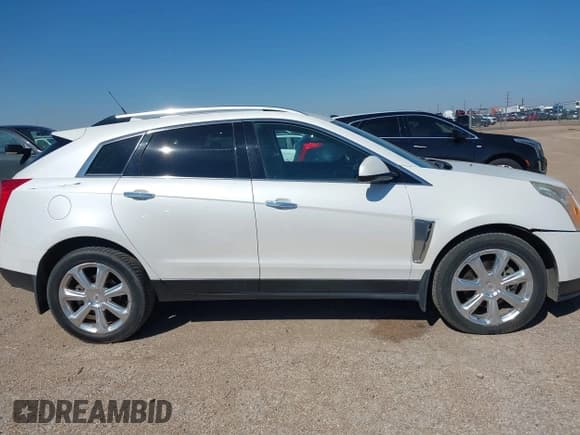 ✅ 2013 Cadillac SRX Premium Collection • VIN: 3GYFNJE35DS649418 • Лот: 43119594. Опубликован ранее на IAAI с пробегом 119 910 миль. Бесплатный доступ к архиву аукционных продаж из США и подробный отчёт об истории автомобиля на DreamBid. Изображение 13.