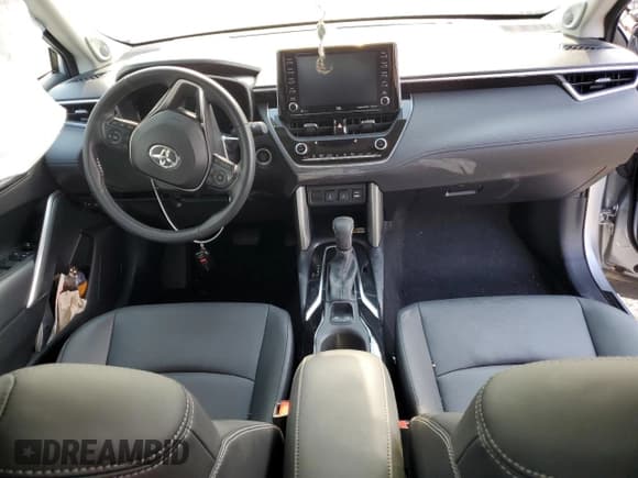 ✅ 2022 Toyota Corolla Cross XLE • VIN: 7MUDAABG9NV021017 • Lot: 66562555. Listed on Copart with 14,394 mi. Free auction sales archive from the USA and detailed vehicle history report at DreamBid. Image 8.