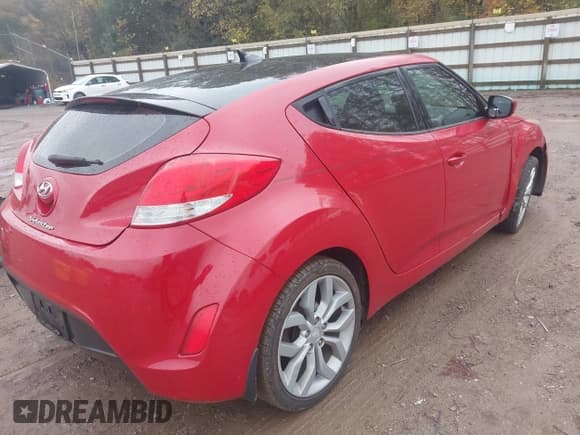 ✅ 2012 Hyundai Veloster w/Red Int • VIN: KMHTC6AD5CU066240 • Lot: 43544107. Listed on IAAI with 196,722 mi. Free auction sales archive from the USA and detailed vehicle history report at DreamBid. Image 4.