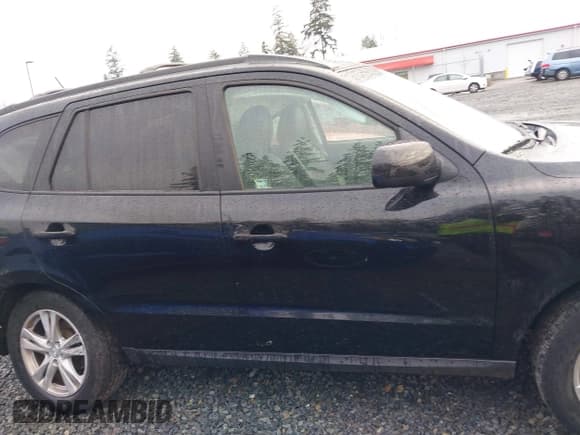 ✅ 2011 Hyundai Santa Fe Limited • VIN: 5XYZHDAG5BG002875 • Lot: 41233043. Listed on IAAI with 64,232 mi. Free auction sales archive from the USA and detailed vehicle history report at DreamBid. Image 13.
