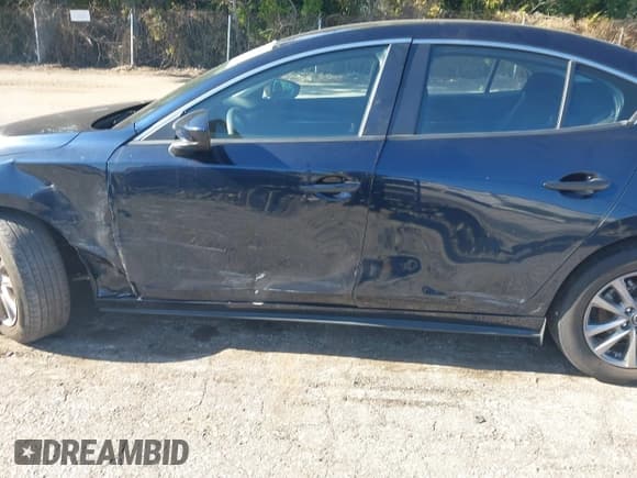 ✅ 2021 Mazda 3 S • VIN: JM1BPAALXM1313494 • Lot: 43250510. Listed on IAAI with 37,371 mi. Free auction sales archive from the USA and detailed vehicle history report at DreamBid. Image 14.